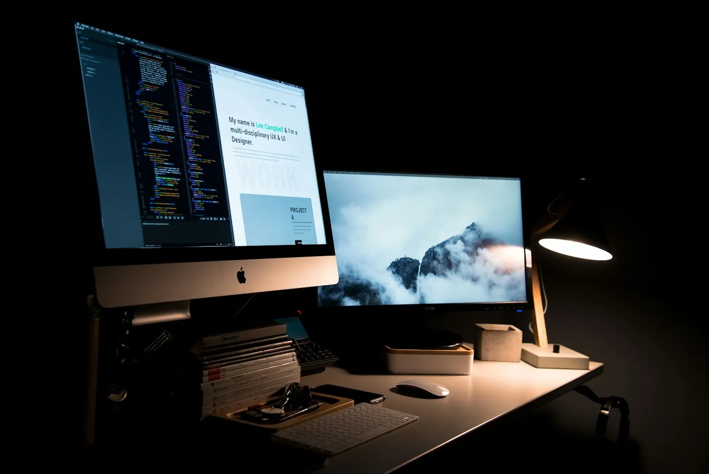 Old and new website mockups side by side on a designer's screen