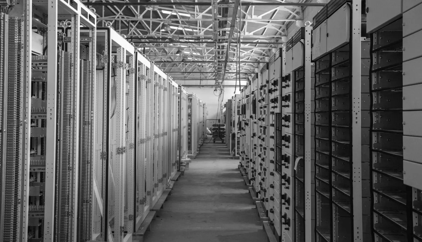 Rows of server equipment racks in a data room